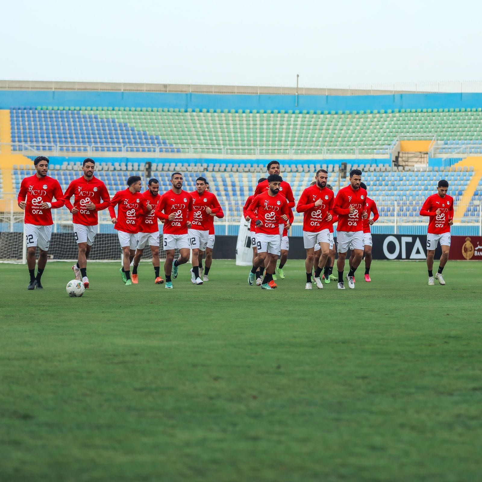 May be an image of 10 people, people playing soccer and text